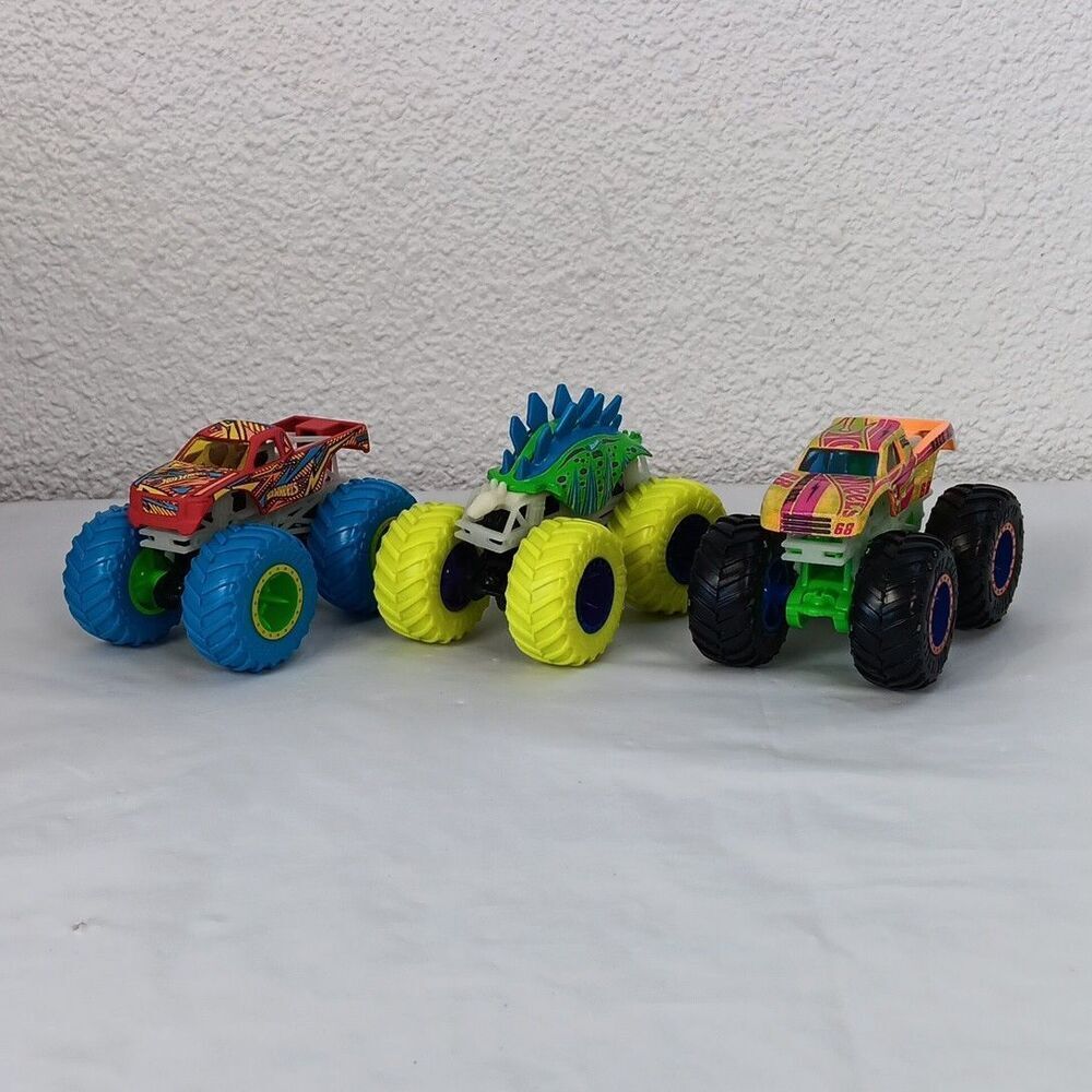 Hot Wheels Monster Trucks Neon Die Cast Stegosaurus Torque Terror Race Ace Lot